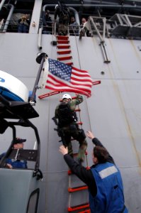 US Navy 080205-N-0807W-020 Sailors assigned to the visit, board, search and seizure team from the dock landing ship USS Harpers Ferry (LSD 49) board the Military Sealift Command fleet replenishment oilier USNS Pecos (T-AO 197)