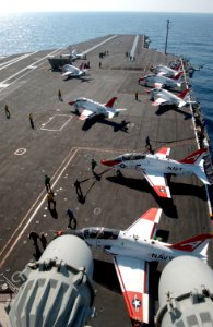 US Navy 080201-N-7571S-001 T-45 Goshawk training aircraft are staged on the flight deck of the Nimitz-class aircraft carrier USS Theodore Roosevelt (CVN 71)