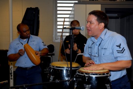 US Navy 080207-N-8102J-004 Musician 2nd Class Joaquin Hernandez, member of the bands Jazz Ensemble, belts out a Latin song during a rehearsal for an upcoming concert