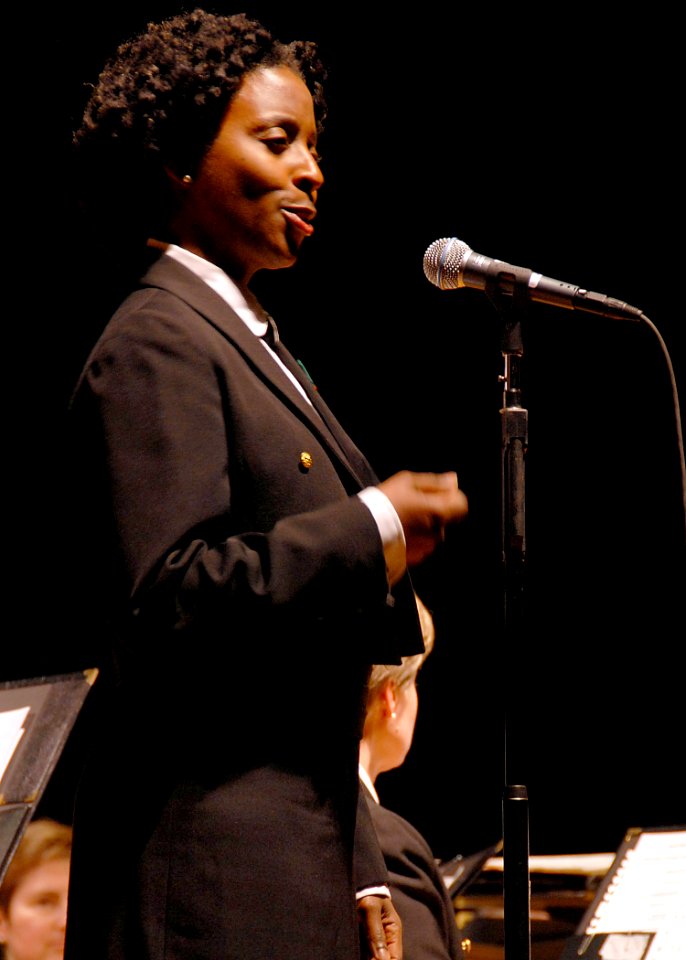US Navy 080211-N-0773H-050 Chief Musician Tia F. Wortham sings the vocals for