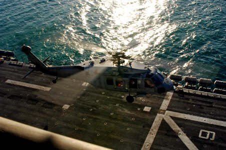 US Navy 080205-N-8335D-015 An MH-60S Seahawk assigned to Helicopter Sea Combat Squadron (HSC) 21 lands on the amphibious assault ship USS Tarawa (LHA 1). The Tarawa Expeditionary Strike Group is deployed to the U.S. 5th Fleet a