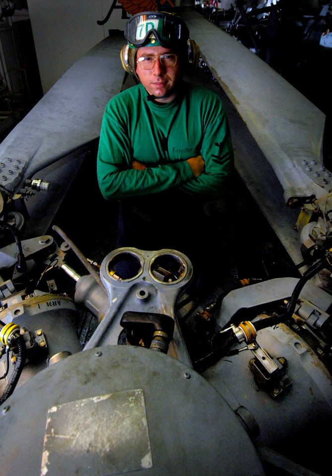US Navy 080214-N-2984R-030 Aviation Machinist's Mate 2nd Class Patrick Forester, assigned to the