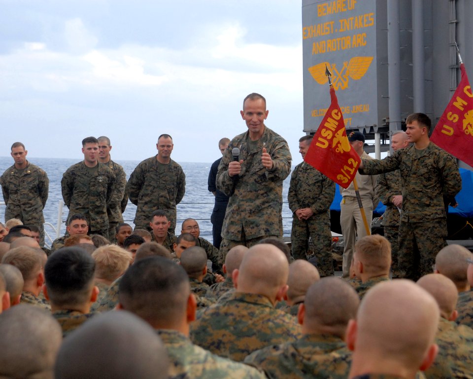 US Navy 080214-N-5067K-409 Col. John L. Mayer, commanding officer of the 31st Marine Expeditionary Unit (MEU) congratulates the Marines of 31st Marine Expeditionary Unit (31st MEU) aboard the amphibious transport dock USS Junea