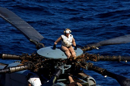 US Navy 080212-N-8335D-054 Helicopter pilot Capt. Heather R. Holbert, assigned to Marine Medium Helicopter Squadron Reinforced (HMM (REIN)) 166 conducts a preflight inspection of her CH-53E Super Stallion