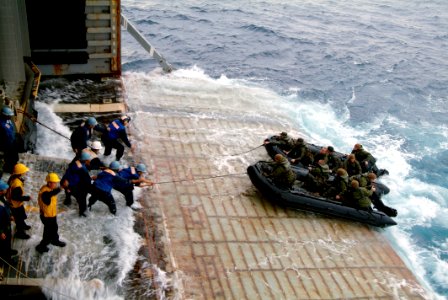 US Navy 080210-N-0807W-191 Combat rubber raiding crafts return to dock landing ship USS Harpers Ferry (LSD 49) during Spring Patrol 2008 Blue-Green workups