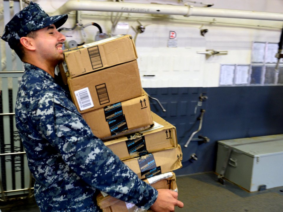 USS America mail call 140824-N-LD343-003