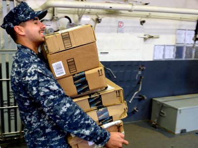USS America mail call 140824-N-LD343-003