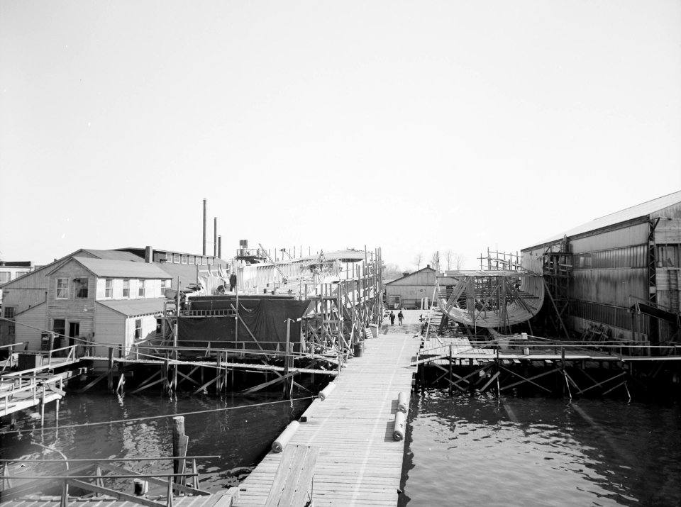 USS Agile (MSO-421) and USS Salute (MSO-470) under construction in 1954