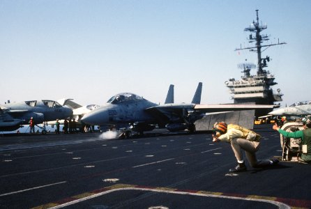 USS America (CV-66) prepares to launch F-14 Tomcat off coast of Libya 1986