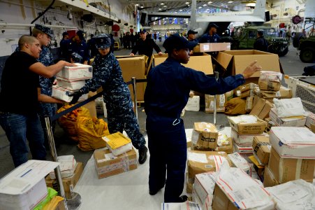 USS America mail call 140824-N-LD343-004