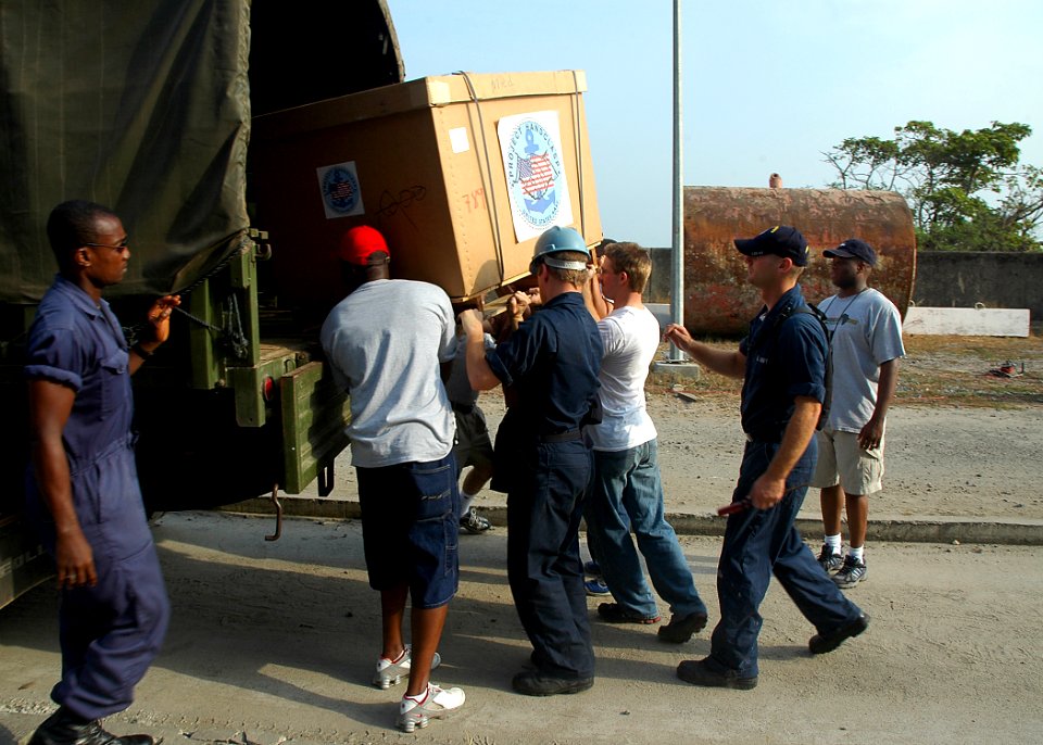 US Navy 080213-N-0577G-010 Africa Partnership Station (APS) Sailors load Project Handclasp medical supplies onto a supply truck for donation to the Ghanaian Navy Western Command hospital