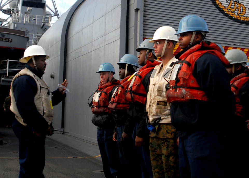 US Navy 080214-N-5067K-381 Boatswain's Mate Senior Chief Rodney S. Smith speaks the Sailors and Marines assigned to replenishment at sea station 2 after an underway replenishment