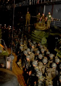 US Navy 080217-N-5067K-295 Marines of the Philippine Marine Corps embark from a landing craft utility to the well deck of the amphibious transport dock ship USS Juneau (LPD 10)
