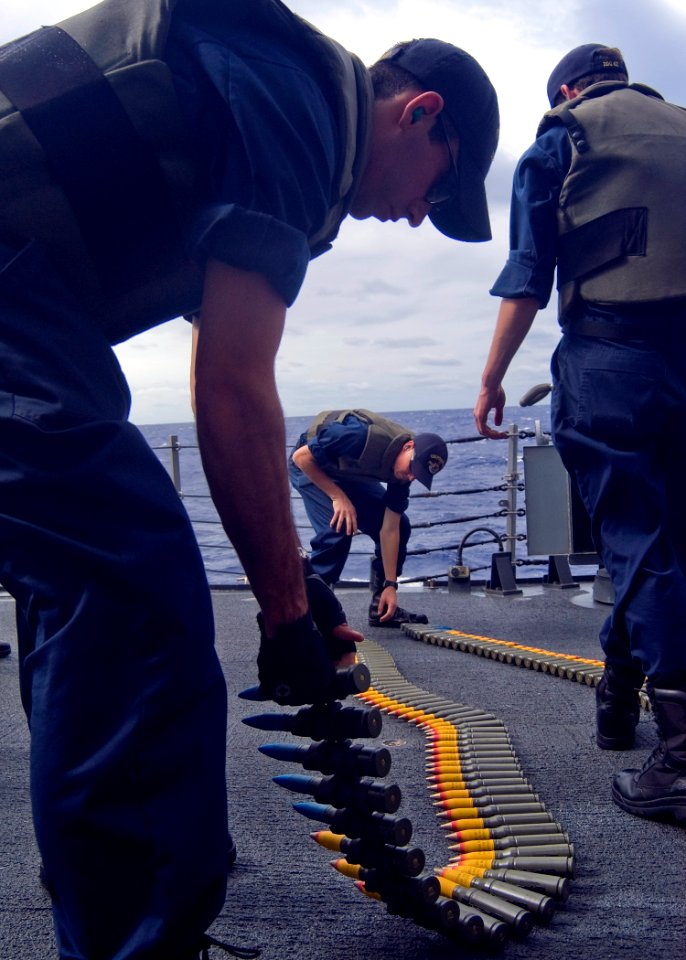 US Navy 080216-N-5253W-001 Sailors aboard the Arleigh Burke-class guided-missile destroyer USS Fitzgerald (DDG 62) in preparation for a live-fire, small-craft action team (SCAT) drill while underway in the western Pacific