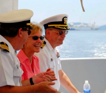 US Navy 080530-N-9689V-005 U.S. ambassador to the Philippines Kristie A. Kenney, center, Capt. Robert Wiley, and Capt. James Rice take a band-aid boat ride from Mercy