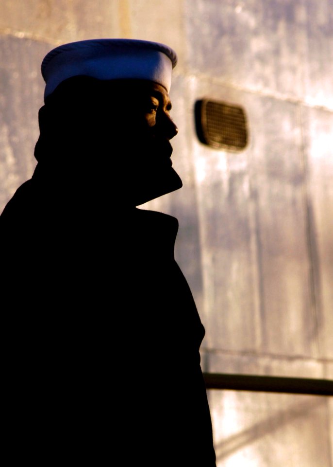 US Navy 080220-N-8907D-060 Aviation Boatswain's Mate (Hydraulic) Mashalik Keeley stands a quarterdeck watch aboard the multi-purpose amphibious assault ship USS Nassau (LHA 4) before departing Naval Station Norfolk