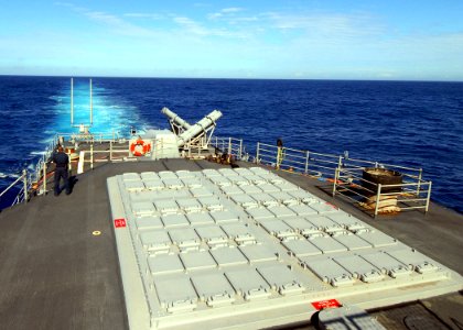 US Navy 080218-N-5476H-050 Seaman Robert Paterson, of Norgo, Cal., stands watch next to the aft vertical launch missile platform on the Fantail while underway on the guided-missile cruiser USS Lake Erie (CG 70)