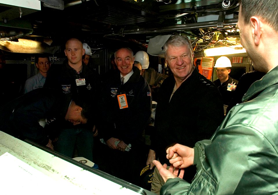 US Navy 080221-N-8273J-049 Chief of Naval Operations (CNO) Adm. Gary Roughead talks with Cmdr. Mike Stevens, right, commanding officer of the pre-commissioned unit PCU New Hampshire (SSN 778), while touring General Dynamics Ele