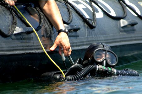 US Navy 080609-N-8298P-023 A diver conducts mine clearing diving operations during a Frontier Sentinel exercise, an annual maritime homeland security exercise taking place in the northern Atlantic photo