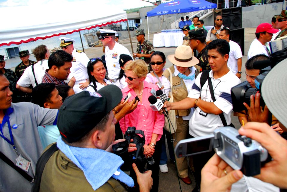 US Navy 080530-N-9689V-008 U.S. ambassador to the Philippines Kristie A. Kenney is surrounded by media during the opening ceremony for the Pacific Partnership mission in the Philippines
