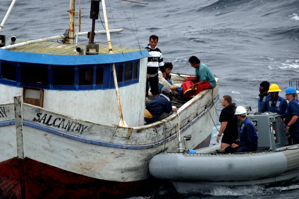 US Navy 080610-N-8649C-001 Sailors assigned to the guided-missile destroyer USS Forrest Sherman (DDG 98)assist crew members of the Peruvian fishing vessel Salcantay after the small craft became stranded 20 miles offshore