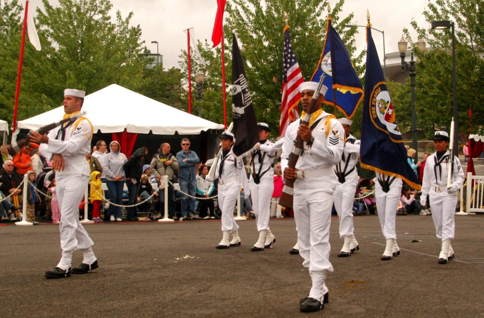 US Navy 080607-N-7783B-003 Service members assigned to the guided-missile destroyer USS Preble (DDG 88) march in the Grand Floral Parade as part of the 101st Annual Rose Festival during Fleet Week in Portland
