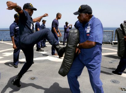 US Navy 080610-G-2443T-010 Lt. Placido Ndong, left, and Lt. Pablo Nkisogo, assigned to the Equatorial Guinea Navy, conduct maritime-law enforcement tactics training