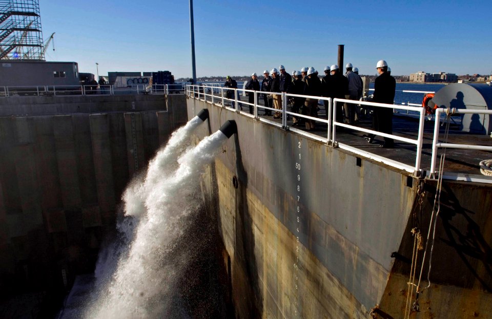 US Navy 080221-N-8273J-034 Chief of Naval Operations (CNO) Adm. Gary Roughead observes the precommissioned unit PCU New Hampshire (SSN 778) touching water for the first time while touring General Dynamics Electric Boat faciliti