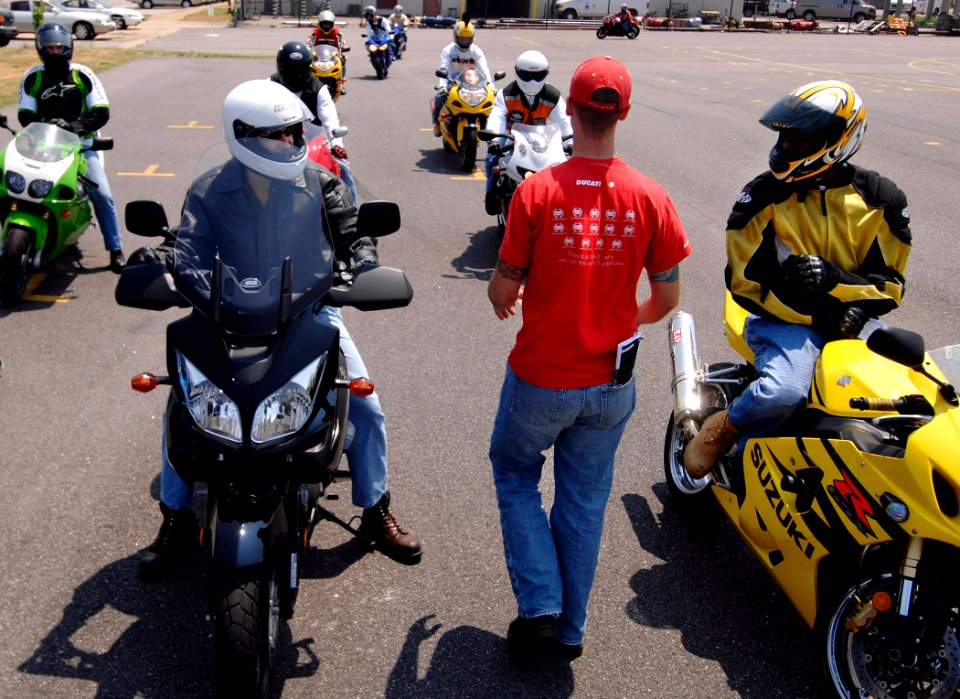 US Navy 080611-N-5345W-145 Volunteer motorcycle safety instructor Nick Brunney gives the command for riders to shut down their bikes after completing the morning session of the first Naval Safety Center-sponsored Military Sport