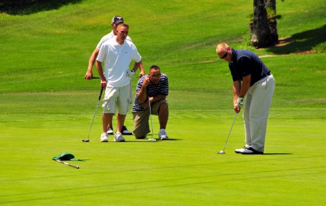 US Navy 080609-N-4774B-865 Sailors and Marines participate in the Inaugural Guide On Charity Golf Tournament at the Admiral Baker Golf Course photo