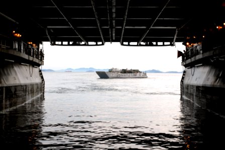 US Navy 080609-N-6936D-012 ) Landing Craft Utility (LCU) 1631 assigned to Assault Craft Unit (ACU) 1 departs the well deck of the forward-deployed amphibious assault ship USS Essex (LHD 2)