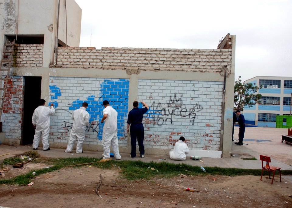 US Navy 080611-A-1539W-211 Sailors embarked aboard the amphibious assault ship USS Boxer (LHD 4) paint the exterior walls of a bathroom at Luis Fabio Xammer Jurado school in Peru during Continuing Promise 2008