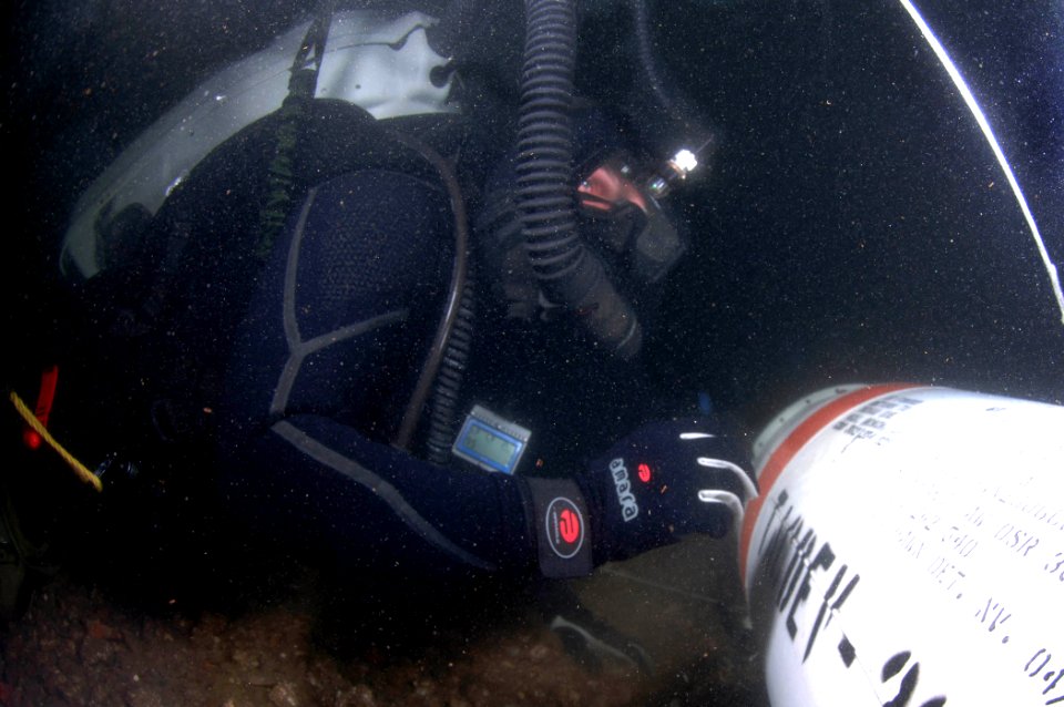 US Navy 080610-N-8298P-004 U.S. Navy Explosive Ordnance Disposal Mobile Unit (EODMU) 2 perform diving operations to raise a mine off the ocean floor during a scenario for Frontier Sentinel photo