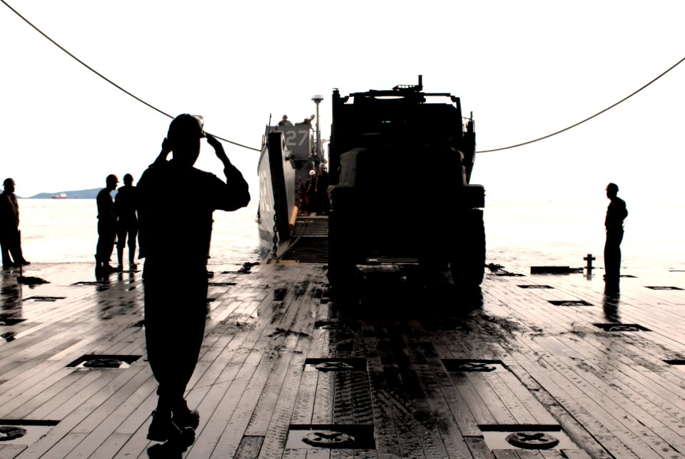 US Navy 080609-N-6936D-190 Sailors assigned to the forward-deployed amphibious assault ship USS Essex (LHD 2) conduct a stern gate marriage with Landing Craft Utility (LCU) 1627