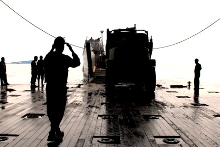 US Navy 080609-N-6936D-190 Sailors assigned to the forward-deployed amphibious assault ship USS Essex (LHD 2) conduct a stern gate marriage with Landing Craft Utility (LCU) 1627