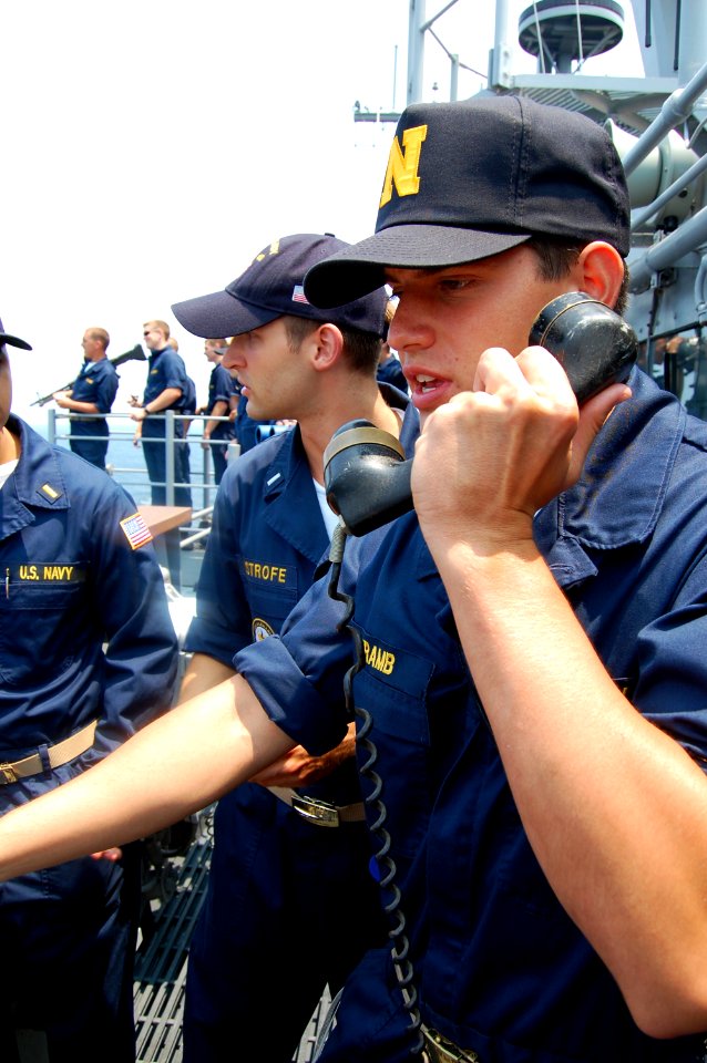 US Navy 080611-N-4124C-003 Midshipman 3rd Class John E. Kramb conns the ship during Divisional Tactics aboard the guided-missile cruiser USS Normandy (CG 60)