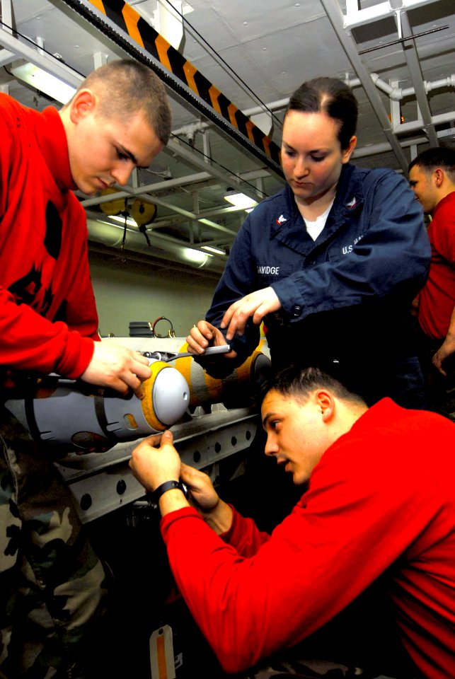US Navy 080609-N-6538W-214 ailors assemble guided bomb unit (GBU) 38 aboard the Nimitz-class aircraft carrier USS John C. Stennis (CVN 74)