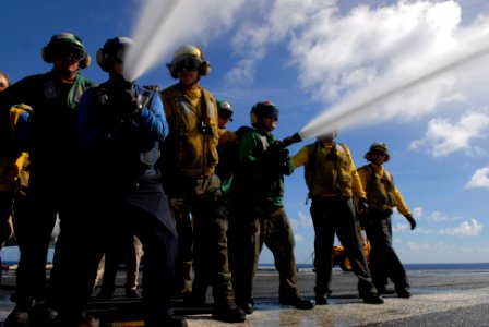 US Navy 080615-N-4005H-180 Sailors conduct firefighting training on the flight deck of the Nimitz-class aircraft carrier USS Ronald Reagan (CVN 76)
