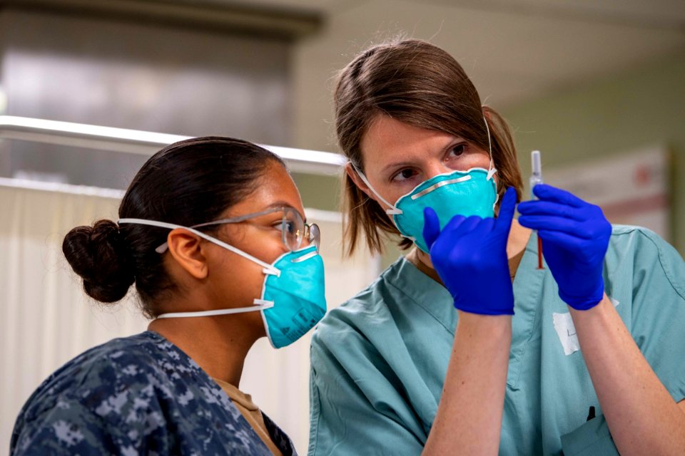 USNS Mercy Sailors Work in ICU (49798814441)