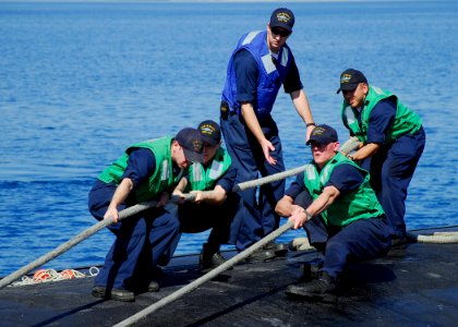 US Navy 080611-N-0780F-007 Sailors conduct mooring operations aboard the fast attack submarine USS Albany (SSN 753) as they arrive for a routine port visit
