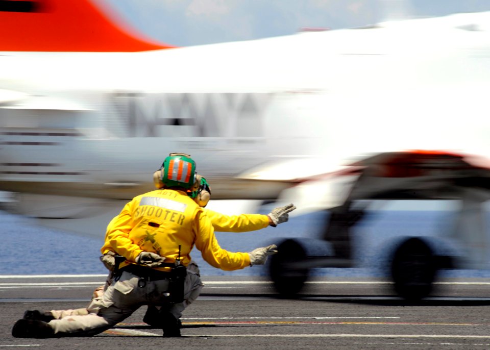 US Navy 080612-N-7571S-003 Lt. Cmdr. Eric Hanks and Lt. Derrick Eastwood shoot a T-45 Goshawk from a catapult during flight operations aboard the Nimitz-class aircraft carrier USS Theodore Roosevelt (CVN 71)