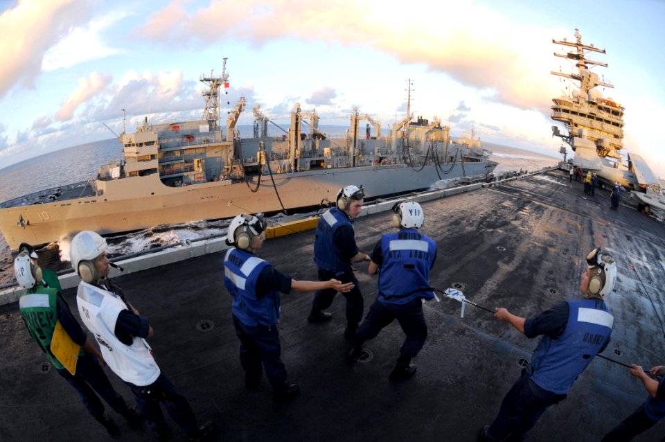 US Navy 080614-N-5961C-004 Sailors assigned to the aircraft carrier USS Ronald Reagan (CVN 76) handle the phone and distance line during a replenishment at sea (RAS) with Military Sealift Command fast combat support ship USNS B