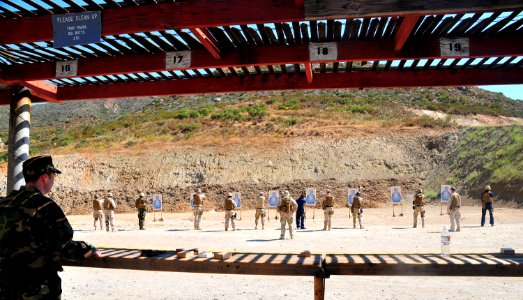 US Navy 080619-N-4774B-150 Sailors assigned to Combat Camera Pacific and the Fleet Public Affairs Center Pacific train using the 9 mm gun at the South Bay Rod and Gun Club