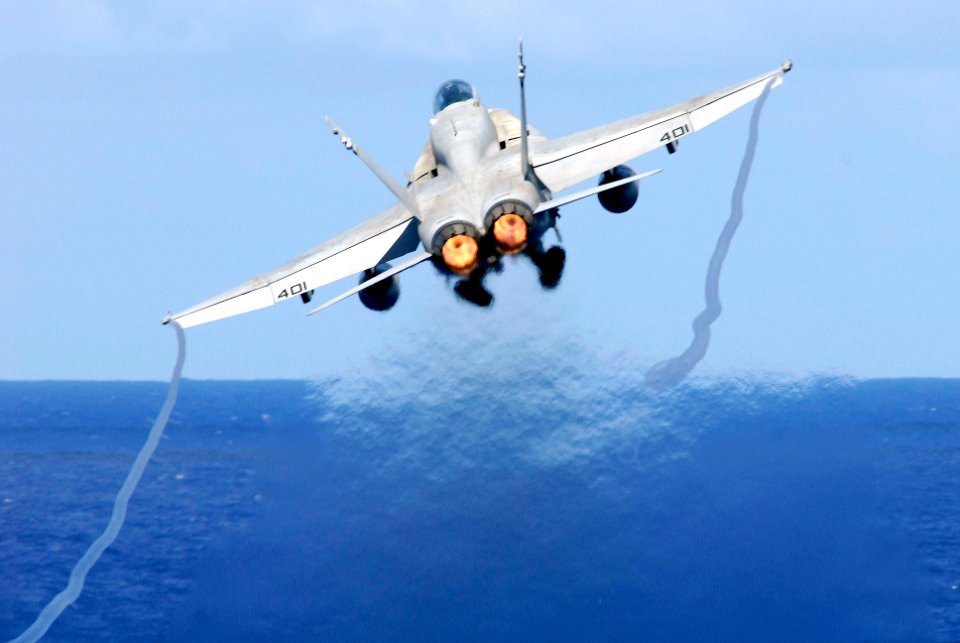 US Navy 080615-N-7883G-046 An F-A-18C Hornet assigned to Strike Fighter Squadron (VFA) 195 launches from the flight deck of the aircraft carrier USS Kitty Hawk (CV 63)