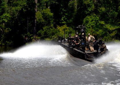 US Navy 080617-N-3857R-019 Special warfare combatant-craft (SWCC) crewmen assigned to Special Boat Team 22 traverse the waterways of the Stennis Space Center