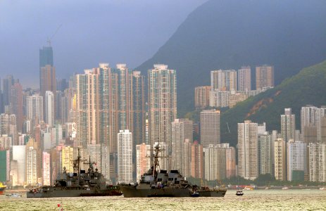 US Navy 080619-N-5961C-004 The guided-missile cruiser USS Chancellorsville (CG 62), left, and the guided-missile destroyer USS Decatur (DDG 73) are moored at the foot of Victoria Peak in Hong Kong