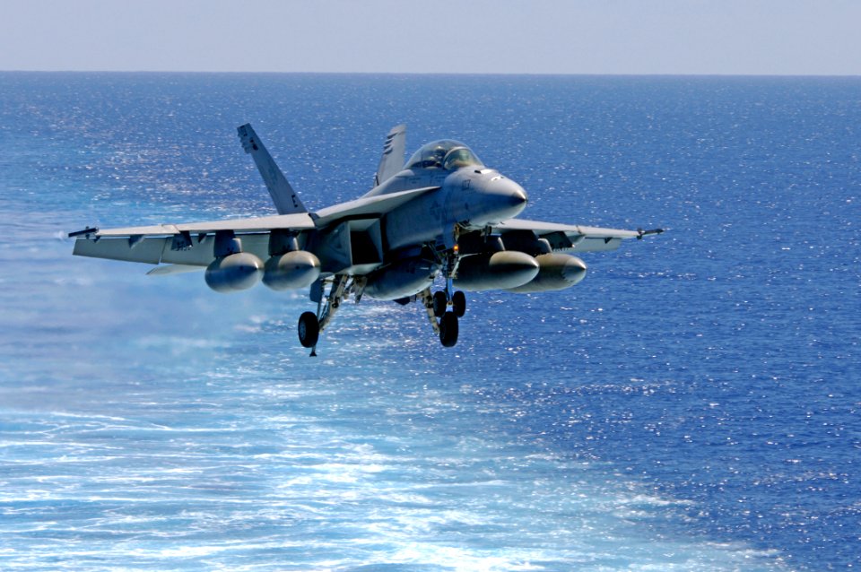 US Navy 080617-N-7883G-072 An F-A-18F Super Hornet assigned to Strike Fighter Squadron (VFA) 102 prepares to land aboard the air craft carrier USS Kitty Hawk (CV 63)