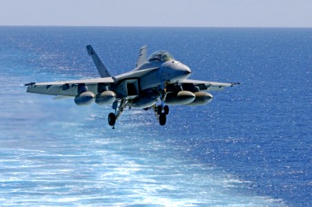 US Navy 080617-N-7883G-072 An F-A-18F Super Hornet assigned to Strike Fighter Squadron (VFA) 102 prepares to land aboard the air craft carrier USS Kitty Hawk (CV 63)