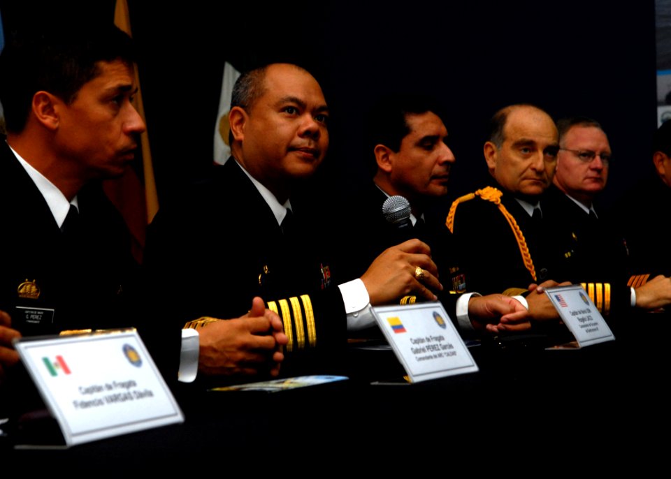 US Navy 080621-N-1226D-137 Capt. Rogelio Laco, commodore, Destroyer Squadron 40, listens in to a question as representatives of all the nations participating in UNITAS 49-08 sit in