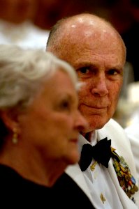 US Navy 080614-N-9818V-269 Retired Master Chief Petty Officer of the Navy (MCPON) Thomas Crow looks on at his wife, Carol Crow, during the 110th Hospital Corpsman Birthday Ball